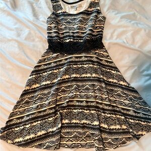Chic Black and Cream Patterned Mini Dress